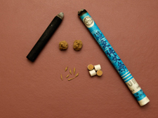 Moxibustion comes in several forms.  There are cigar-like sticks, smokeless moxa with a higher charcoal content, loose moxa which can be rolled into rice grains or bigger chunks, and even pre-rolled small cigars to be used on the handle of needles.
